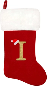 Detail view of a red Christmas stocking featuring a large glittery gold letter I