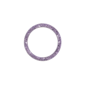 Close-up of sparkling purple crystal car engine start button decorative ring trim