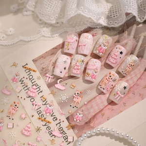 Pink Christmas theme press-on nails set with 3D embossed deer and snowflake designs