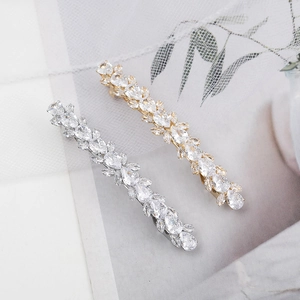 Sparkling crystal leaf hair clips in gold and silver finish with marquise zircons