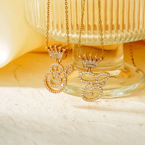 Exquisite gold crown initial necklace with sparkling pavé cubic zirconia for men and women
