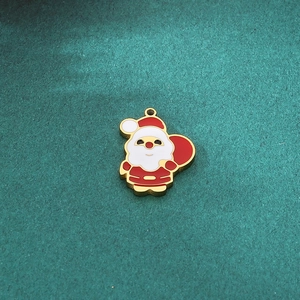Detailed view of Santa Claus enamel pendant with red and white finish for DIY jewelry