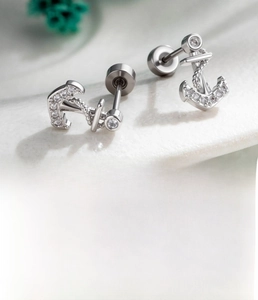 Macro shot of silver anchor ear stud with micro-set zircons and 4mm flat back screw