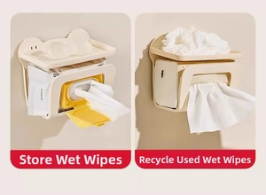 Detail showing wall-mounted dual-layer wipe dispenser with used wipe disposal compartment