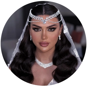 Silver bridal jewelry set with crystal forehead chain, waterdrop earrings and V-necklace