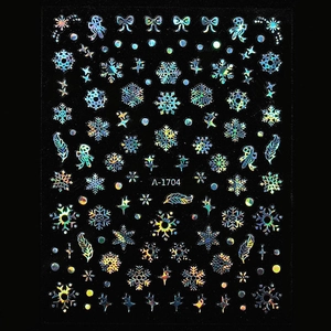 Holographic laser snowflake and bow nail art decals for Christmas design on black background
