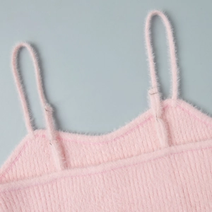 Detail of pink faux mink fur knit camisole with ribbed texture and thin straps