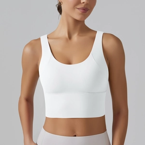 Close-up of the wide supportive hem and high-elastic fabric on this white sports bra