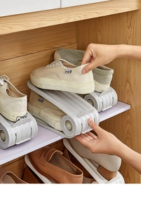 Space-saving white double-layer plastic shoe organizer showing dual storage usage