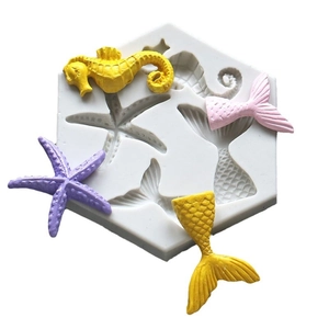 Ocean silicone mold with seahorse, starfish and mermaid tail shapes for cake decorating
