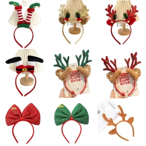 Nine-piece Christmas headband set featuring reindeer antlers and holiday glitter bows