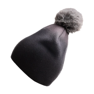 Detailed knit texture and soft faux fur pompom on gradient tie-dye winter beanie