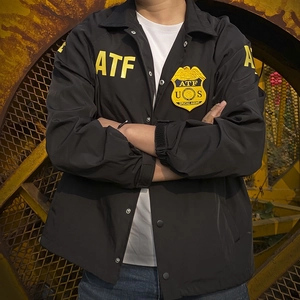 Tactical black windproof jacket featuring yellow ATF special agent patches and lettering
