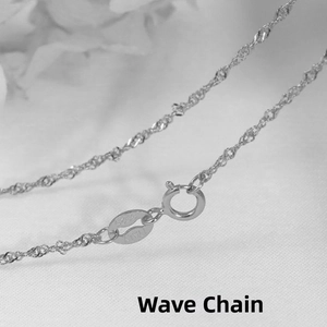 Macro shot showing S925 and ITALY hallmarks on a sterling silver wave water chain