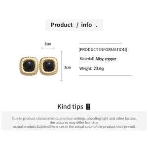 Detail view of retro geometric square stud earrings showing 3cm size and copper material