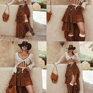 Western style brown corset top and lace skirt set with cowgirl hat and fringe bag