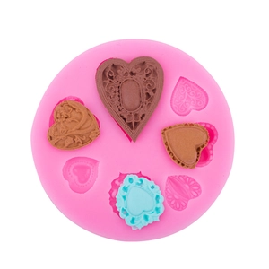 Moule en silicone rose en forme de cœur pour décoration de gâteau fondant avec relief floral