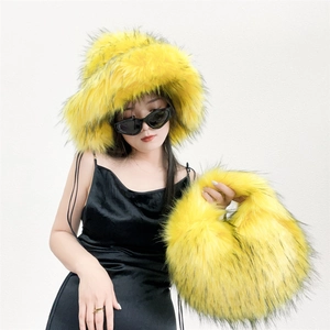 Faux fox fur bucket hat and matching yellow plush handbag for autumn winter fashion outfit