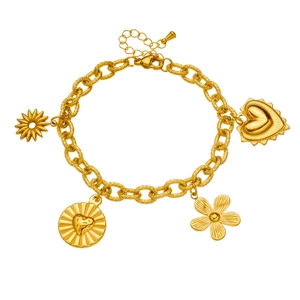 Gold-tone heavy chain bracelet with flower, heart, and disc charms on a white background