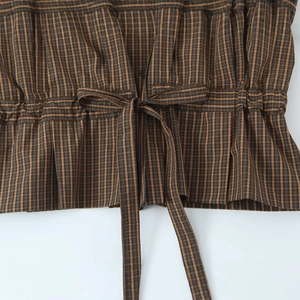 Fashionable plaid cotton shirt with waist drawstring and bow detail in brown and orange