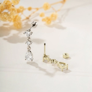 Vintage gold and silver drop zircon cartilage studs with screw back fastening