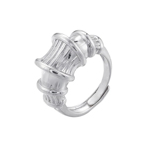 Macro shot of polished silver ribbed ring with vertical bamboo pattern and adjustable band