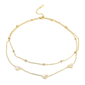 Double-layered gold heart necklace featuring white shell pendants and sleek bead chain
