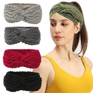 Detail view of winter knitted headband showing soft fleece lining and twist knot design