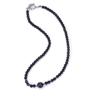 Detail of 6mm obsidian beaded necklace with blue tiger eye stone and secure T-bar clasp