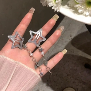 Star-shaped hair clips with long silver tassels, faux pearls and heart pendants
