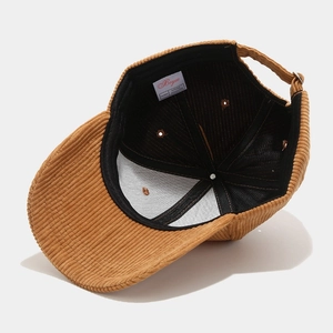 Brown corduroy baseball cap with breathable cotton lining and adjustable strap