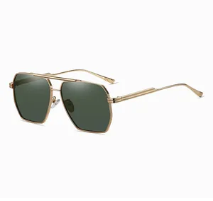 Detail of golden metal frame polarized sunglasses with geometric hexagonal dark lenses