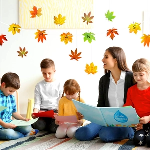 Fall bulletin board decor with colorful maple leaf cutouts for classroom thanksgiving