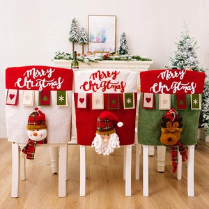 Three festive Christmas chair covers with 3D Santa, Snowman and Reindeer character dolls