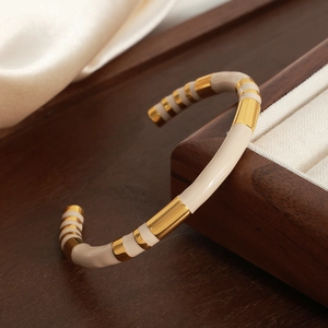 Retro gold-plated striped enamel open cuff bracelet with minimalist beige and gold accents