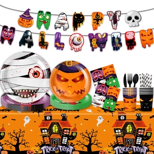 Complete Halloween party supplies set with themed plates, cups, napkins, and banner decorations
