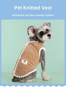 Detailed view of camel ribbed velvet pet vest with white pom-pom trim and bear tag
