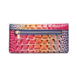 Detail of crocodile embossed long wallet with multicolor gradient and zipper back pocket