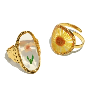 Golden 18K plated stainless steel rings with cherry blossom and daisy resin drip oil