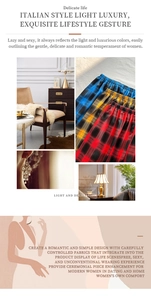 Detail of red, yellow, and blue plaid satin lounge pants with comfortable elastic waist