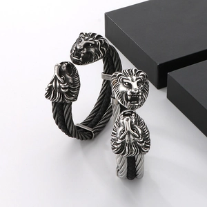 Bracciale rigido testa di leone retrò con pelle intrecciata e cavo in acciaio