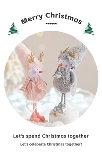Close-up of pink and grey Christmas plush snowmen with wooden antlers and heart charms