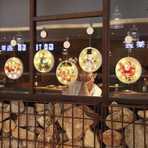 5-pack Christmas LED window suction lights with warm yellow Santa and snowman designs