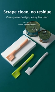 Close-up of silicone pet can spoons with long handles for feeding cats and dogs