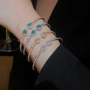 Luxury heart zircon bracelets in gold and silver finish with teardrop accents