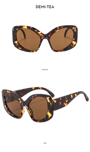 Detail of tortoise shell cat eye sunglasses with tea lenses from front and side views