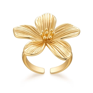 Detail view of 18K gold plated flower ring showing intricate petals and textured metal