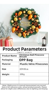 Detailed view of 40cm Christmas wreath with gold baubles, pinecones, and size specifications