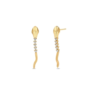 Detailed view of snake-shaped gold earrings set with sparkling zircon stones