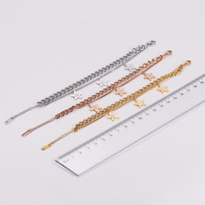 Star charm bracelets in gold silver and rose gold finishes with zircon accents